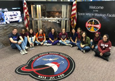 RRHS Biomedical Innovations students pose for the camera at the NASA Space Vehicle Mockup Facility